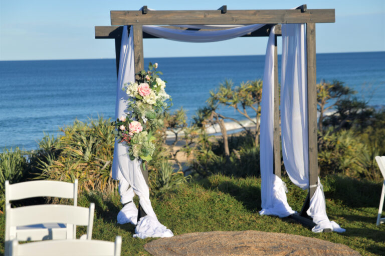 4 post dark wood wedding arbor with cloth
