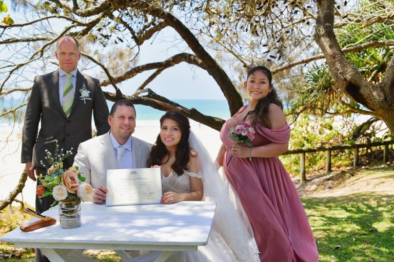signed the registry for the wedding at Noosa beach