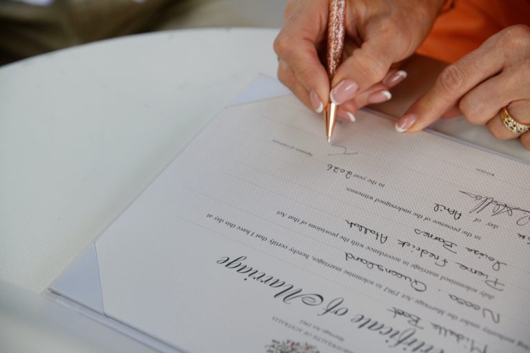 signing the wedding certificate